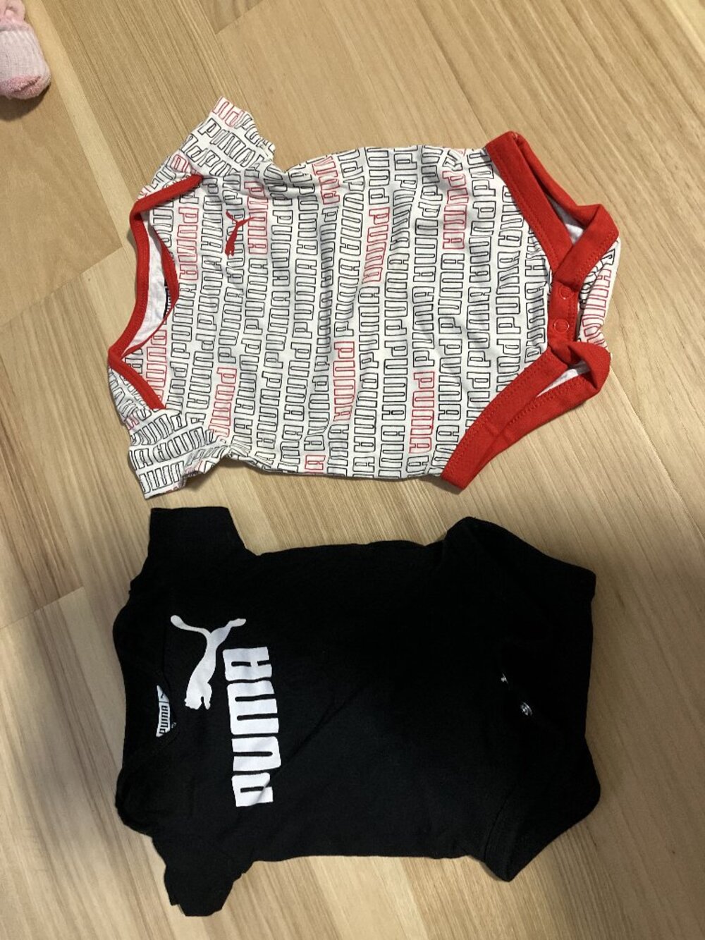 Two Puma Onesies